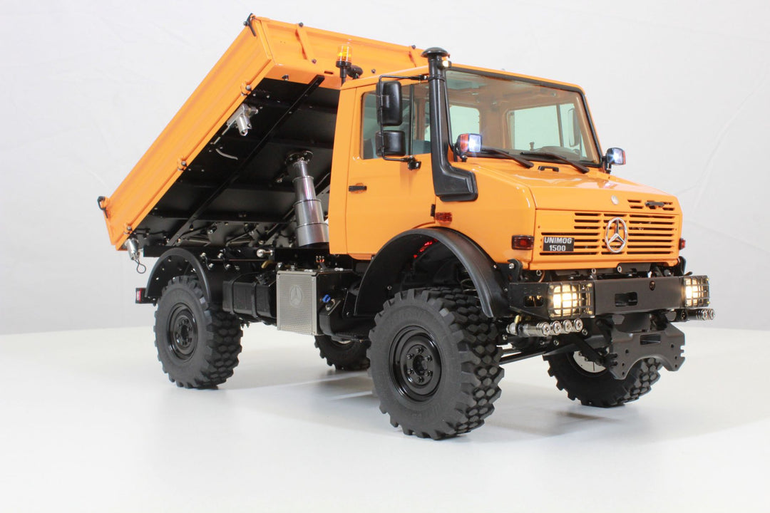 UNIMOG 3.250 mit Kippbrücke und Fronthydraulik
