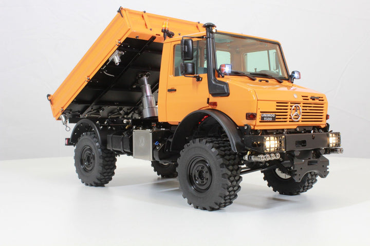 UNIMOG 3.250 mit Kippbrücke und Fronthydraulik