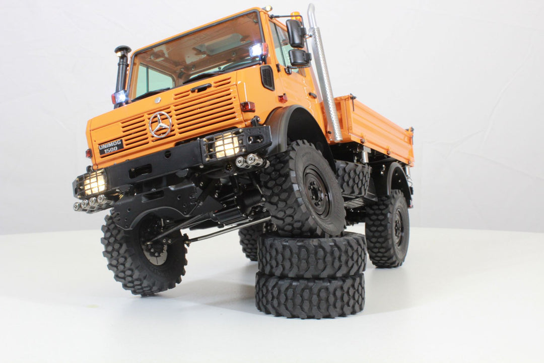 UNIMOG 3.250 mit Kippbrücke und Fronthydraulik