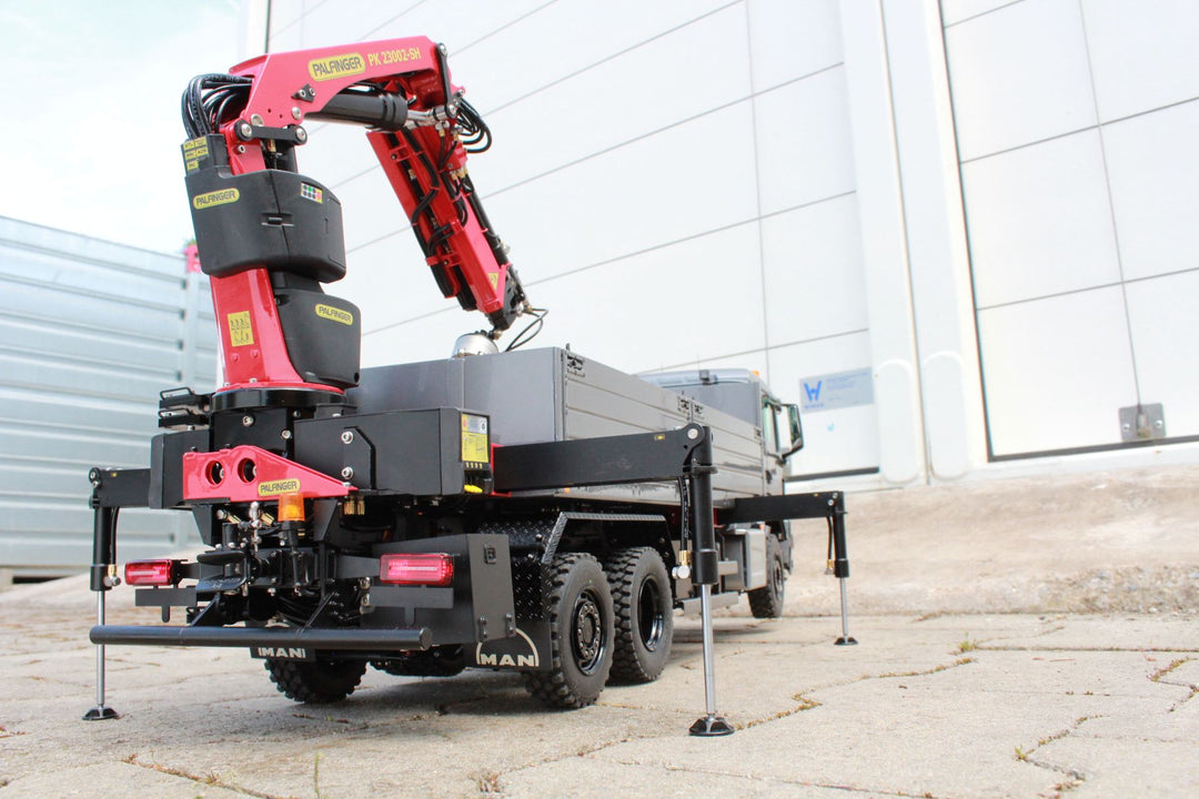 TGS 3-Achs-Baustoff-LKW, Palfinger Heckladekran