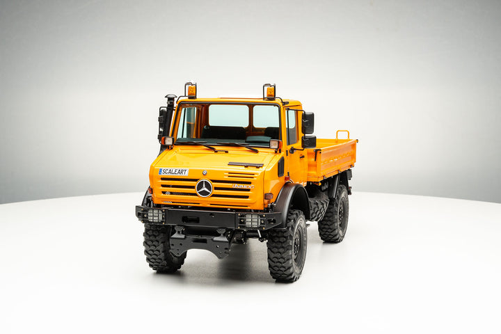 UNIMOG 3.250 mit Pritsche und Fronthydraulik