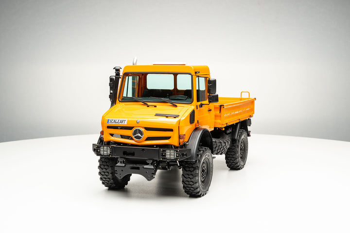 UNIMOG 3.250 mit Pritsche und Fronthydraulik