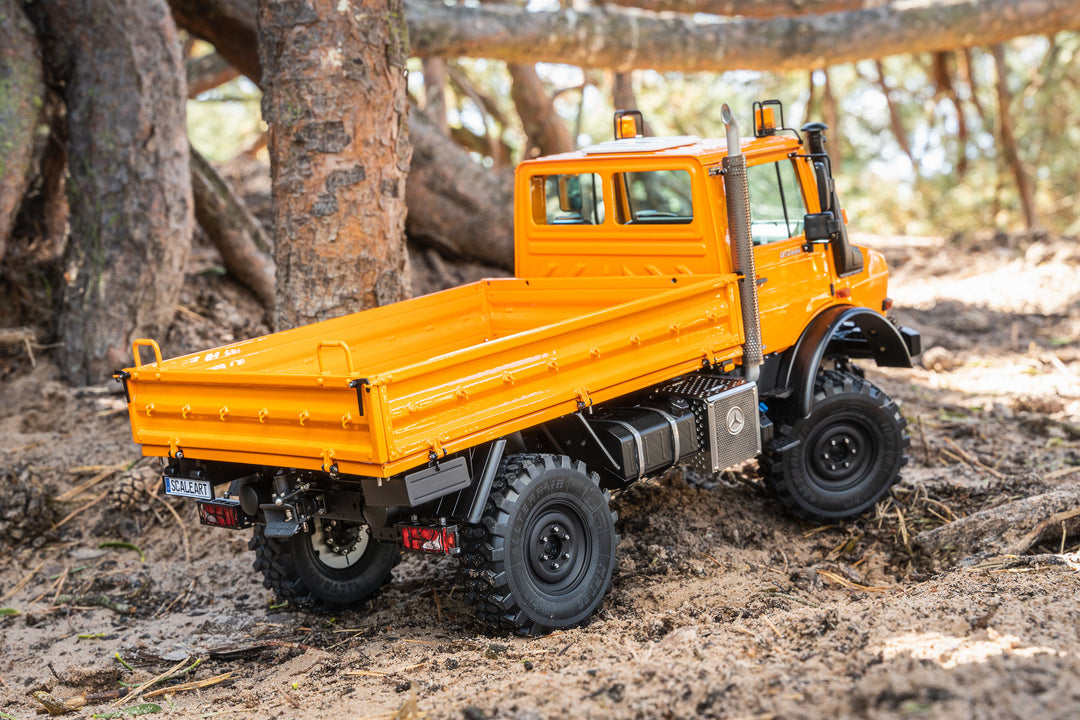 UNIMOG 3.250 mit Pritsche und Fronthydraulik