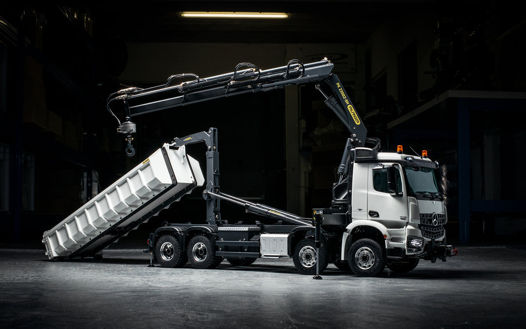 Arocs 4-Achs-Abrollkipper mit  Palfinger Ladekran 8x8
